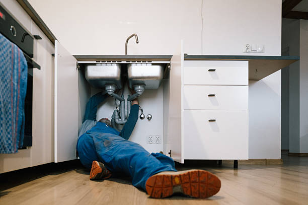 Professional Drain Cleaning technician working in Andrews, TX